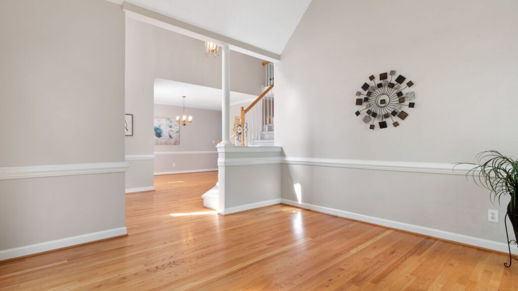 Bright and airy modern interior showcasing hardwood floors and elegant design.